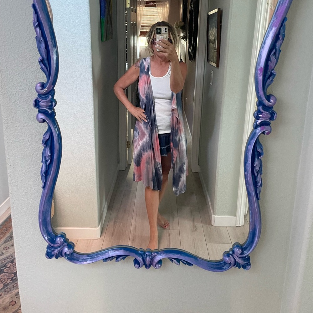 Tie dyed sleeveless duster with hood. Pink and blue. Pockets